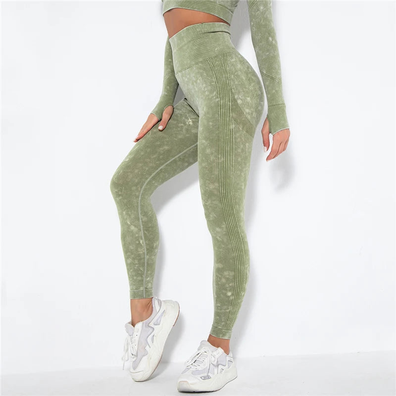 Green leggings worn by a person on a white background