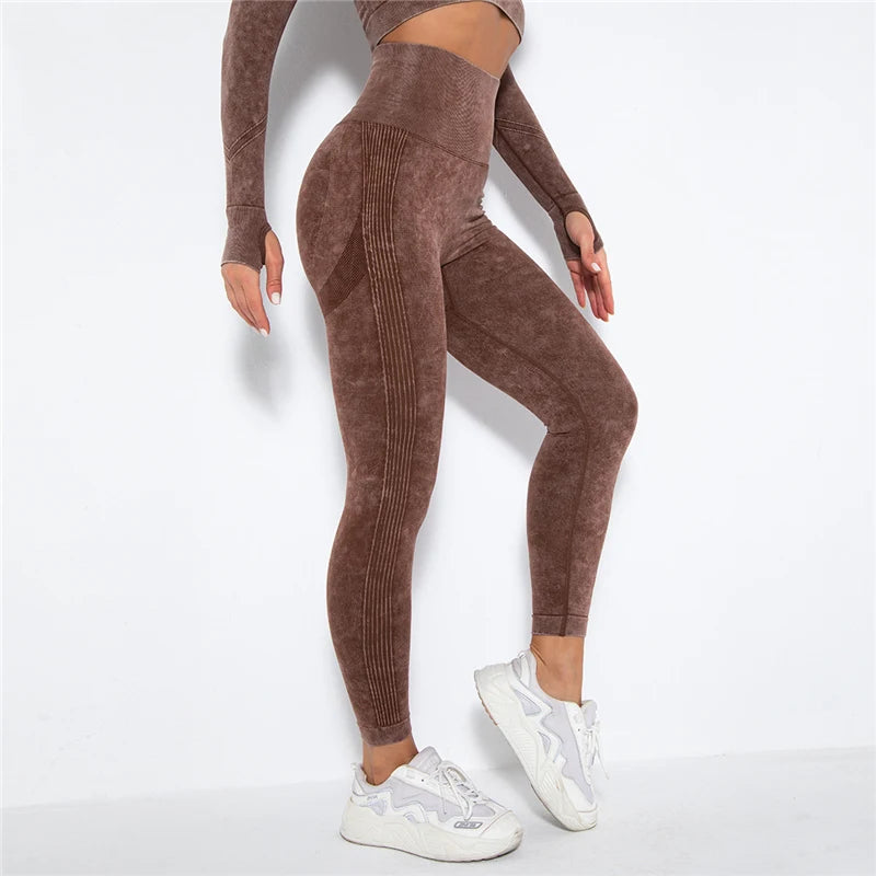 Brown ribbed leggings worn by a person on a white background