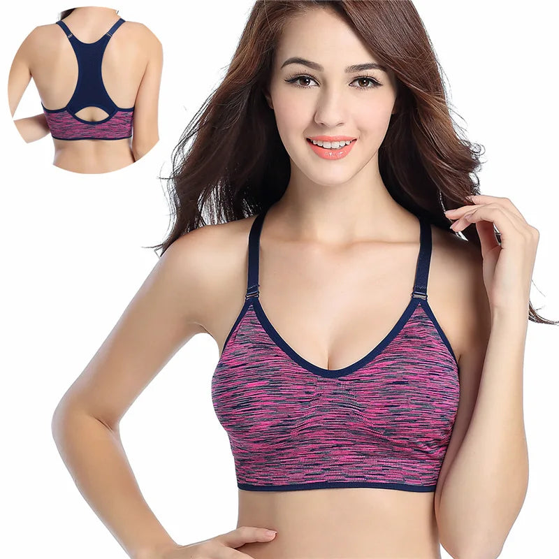 Woman wearing a pink and blue sports bra with a close-up of the back on a white background