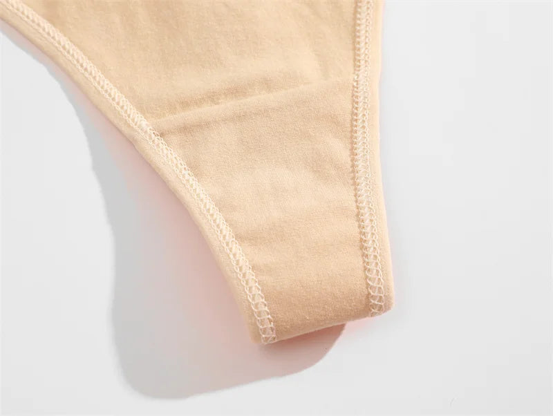Beige underwear on a white background