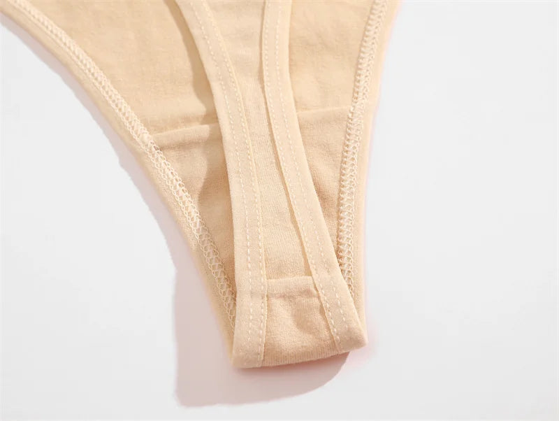 Beige underwear on a light gray background