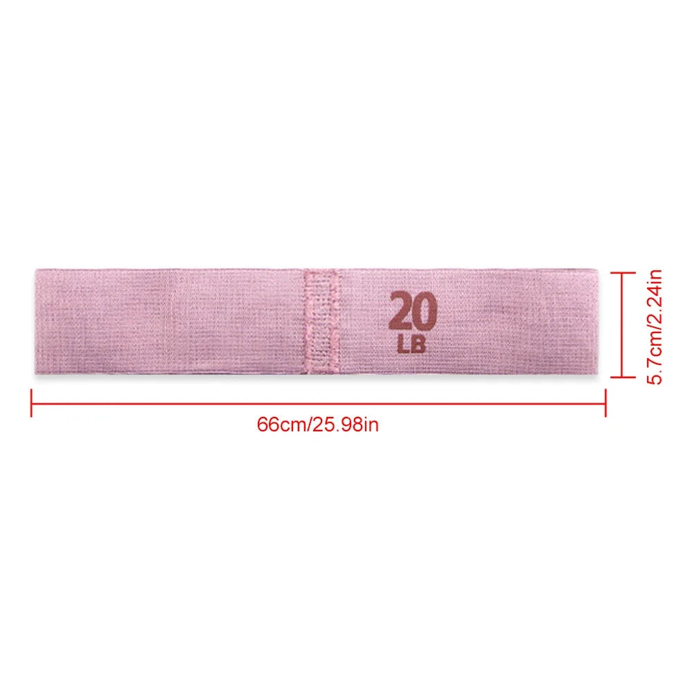 Pink resistance band with '20 LB' marking and measurements on a white background