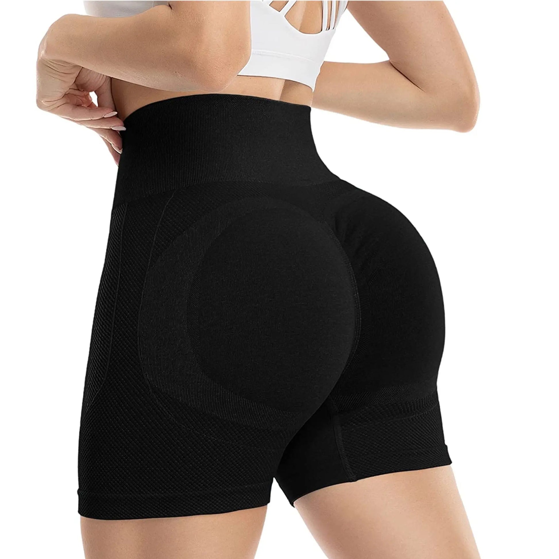Black high-waisted athletic shorts worn by a person on a white background
