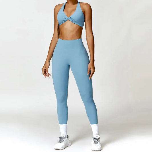 Person wearing a blue athletic outfit on a white background